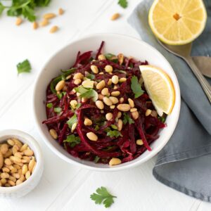 Grated beetroot mixed with roasted peanuts, coriander and lemon dressing